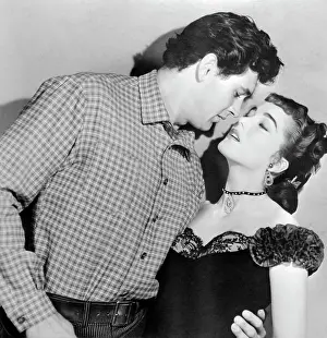 Desire Prints: Julia Adams and Rock Hudson in Intimate Movie Scene