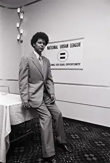 Julian Bond By Urban League Sign