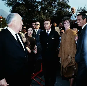 Prints of On the set of the 1966 film Torn Curtain Timeless Charm: A Visual Journey through the lens: Julie Andrews, Paul Newman, Alfred Hitchcock, and Others