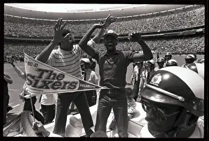 Julius Erving and Andrew Toney Cheering Fans