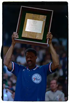 Julius Erving With Momento From Boston Garden