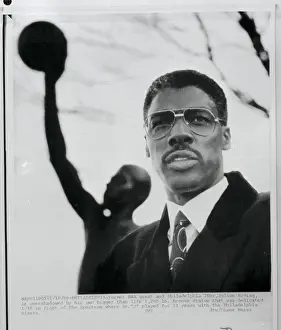 Julius Erving Standing By Honorary Statue