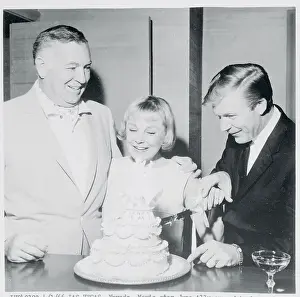 June Allyson and Husband Cutting Cake