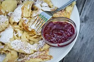 Images Dated 30th June 2012: Kaiserschmarrn, a traditional Austrian dessert, with powdered sugar and cranberry marmalade, fork