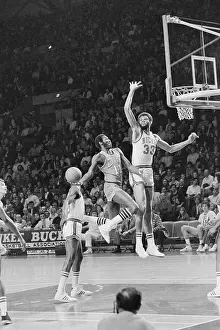 Kareem Abdul-Jabbar and Bob McAdoo Playing Basketball