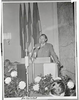 Karl Schmidt-Wittmack Speaking at a News Conference