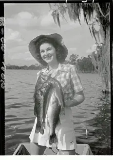 Lakeland Prints: Kathleen Turner Displaying Fish She Caught