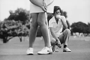 Kathy Whitworth Watching a Golfer's Putt