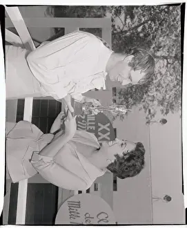 Prints of (Original Caption). Mexican actress Katy Jurando shows her Ariel trophy to actor Marlon Brando after receiving the Oscar like statuette from the Mexican Consul-General in Hollywood August 18th The Iconic Moments Captured: Katy Jurando Showing Her Award to Marlon Brando