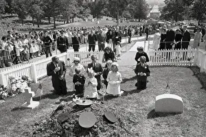 Kennedy Family Members Kneeling at John F. Kennedy Gravesite
