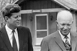 Kennedy Walking with Eisenhower at Camp David