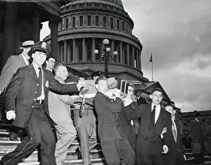 Stretcher Prints: Kenneth Roberts Leaves Capitol on Stretcher