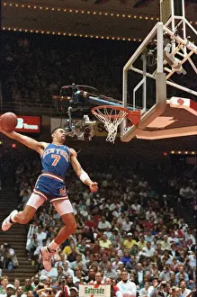 Kenny Walker Dunking Basketball