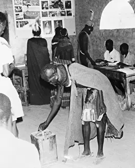 Kenyan Tribeswoman Voting in an Election