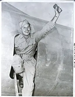 Homecoming Prints: Kermit Beahan Waves From Door Of Bomber