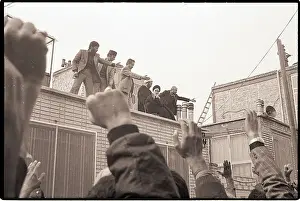 Assistant Prints: Khomeini and Aides on Roof Gesturing Support