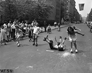 Kids (8-9, 10-12) rollerskating on street