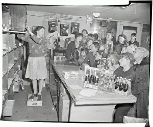 Prints of (Original Caption). The kids in the neighborhood of Harry Jensen's candy shop in Chicago now have a place of their own to see their television shows Timeless TV: A Visual Journey: Kids Drinking Coca Cola and Watching TV in Candy Shop