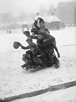 Sled Prints: Kids Piled On Sled; Snow Storm