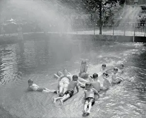 Splashing Prints: Kids refreshing in fountain, New York City, New York State, USA