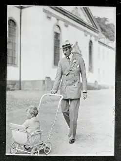 King Christian Pushing Along His Granddaughter