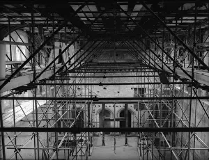 Prints of 25th May 1934: Scaffolding covers the Great Hall of Eltham Palace, south London, while the Courthauld family construct an adjoining country home. (Photo by Fox Photos/Getty Images) Timeless Treasures: Iconic Black and White Prints from the Fox Photo Library: King Johns Palace
