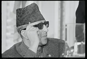 King Mahendra Smoking a Cigarette