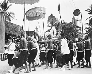 King Sisavang Vong Being Carried by Palace Attendants