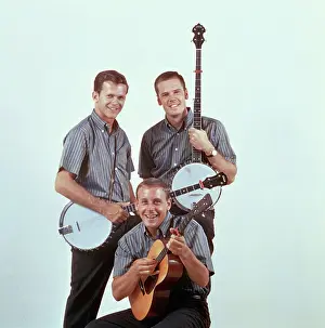 Kingston Trio Holding Instruments