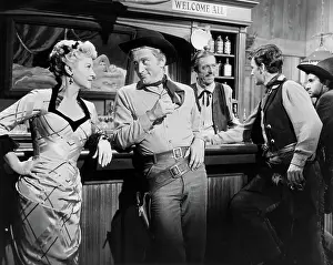 Kirk Douglas and Claire Trevor in a Bar Scene in Man Without A Star