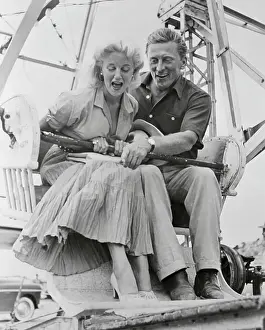 Kirk Douglas and Jan Sterling Riding in Ferris Wheel