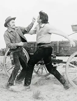 Fist Fight Prints: Kirk Douglas and Johnny Cash in Struggle for Movie A Gunfight