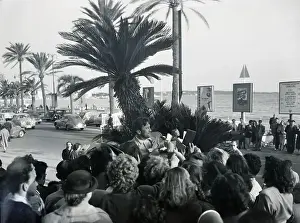 Autographing Prints: Kirk Douglas Surrounded By Crowd