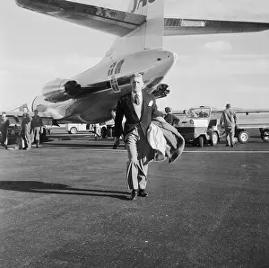 Airline Prints: Kirk Douglas Walking Away from Jet