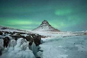Kirkjufell winter Iceland under Aurora