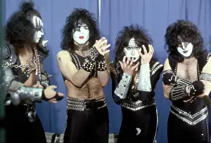 Prints of LOS ANGELES - JANUARY 1983: Gene Simmons, Paul Stanley, Vinnie Vincent and Eric Carr of the rock and roll band Kiss pose for a portrait in January 1983 in Los Angeles, California Icons Unmasked: Kiss Backstage