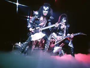 Prints of LOS ANGELES - CIRCA 1977: Gene Simmons, Paul Stanley and Ace Frehley of the rock and roll band Kiss performing onstage in circa 1977. (Photo by Michael Ochs Archives/Getty Images) Icons Unmasked: Kiss Performing