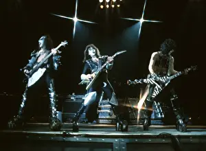 Prints of LOS ANGELES - CIRCA 1977: Gene Simmons, Paul Stanley and Ace Frehley of the rock and roll band Kiss performing onstage in circa 1977. (Photo by Michael Ochs Archives/Getty Images) Icons Unmasked: Kiss Performing