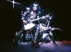 Prints of LOS ANGELES - CIRCA 1977: Gene Simmons, Paul Stanley and Ace Frehley of the rock and roll band Kiss performing onstage in circa 1977. (Photo by Michael Ochs Archives/Getty Images) Icons Unmasked: Kiss Performing
