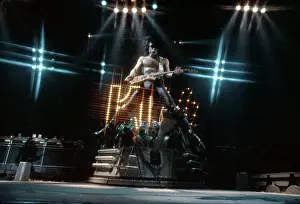 Prints of LOS ANGELES - CIRCA 1977: Gene Simmons, Paul Stanley and Ace Frehley of the rock and roll band Kiss performing onstage in circa 1977. (Photo by Michael Ochs Archives/Getty Images) Icons Unmasked: Kiss Performing