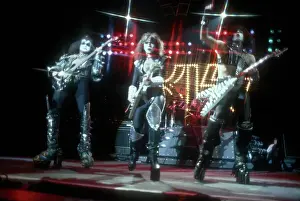Prints of CIRCA 1977: Rock and roll band Kiss performs onstage in circa 1977. (Photo by Michael Ochs Archives/Getty Images) Icons Unmasked: Kiss Performing