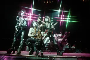 Prints of LOS ANGELES - CIRCA 1983: Gene Simmons, Paul Stanley and Ace Frehley of the rock and roll band Kiss pose for a portrait session backstage on May 31, 1974 in Los Angeles, California Icons Unmasked: Kiss Performing