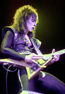 Prints of CIRCA 1983: Guitarist Vinnie Vincent of the rock and roll band Kiss performs onstage in circa 1983. (Photo by Michael Ochs Archives/Getty Images) Icons Unmasked: Kiss Performing