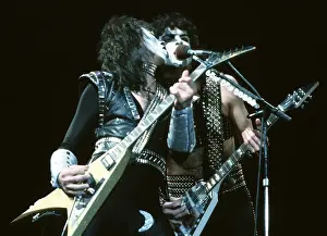 Prints of LOS ANGELES - 1983: Vinnie Vincent and Paul Stanley of the rock and roll band Kiss perform onstage in circa 1983 in Los Angeles, California. (Photo by Michael Ochs Archives/Getty Images) Icons Unmasked: Kiss Performing