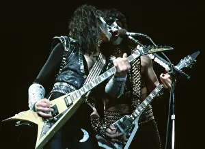 Prints of LOS ANGELES - 1983: Vinnie Vincent and Paul Stanley of the rock and roll band Kiss perform onstage in circa 1983 in Los Angeles, California. (Photo by Michael Ochs Archives/Getty Images) Icons Unmasked: Kiss Performing