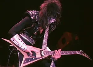 Prints of LOS ANGELES - CIRCA 1983: Guitarist Vinnie Vincent of the rock and roll band Kiss performs onstage in circa 1983 in Los Angeles, California. (Photo by Michael Ochs Archives/Getty Images) Icons Unmasked: Kiss Performing