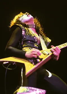 Prints of LOS ANGELES - CIRCA 1983: Guitarist Vinnie Vincent of the rock and roll band Kiss performs onstage in circa 1983 in Los Angeles, California. (Photo by Michael Ochs Archives/Getty Images) Icons Unmasked: Kiss Performing