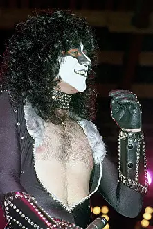 Prints of CIRCA 1985: Drummer Eric Carr of the rock and roll band Kiss performs onstage in circa 1977 (Photo by Michael Ochs Archives/Getty Images) Icons Unmasked: Kiss Performing