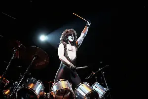 Prints of CIRCA 1985: Drummer Eric Carr of the rock and roll band Kiss performs onstage in circa 1977 (Photo by Michael Ochs Archives/Getty Images) Icons Unmasked: Kiss Performing