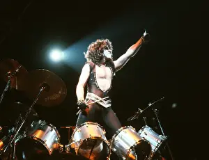 Prints of CIRCA 1985: Drummer Eric Carr of the rock and roll band Kiss performs onstage in circa 1985. (Photo by Michael Ochs Archives/Getty Images) Icons Unmasked: Kiss Performing